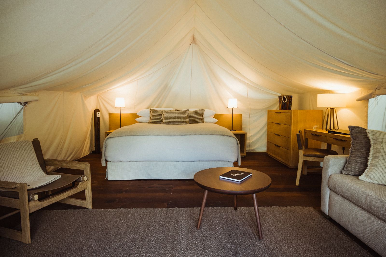 Luxury tent guest suite bed at Clayoquot Wilderness Resort in Vancouver, Canada