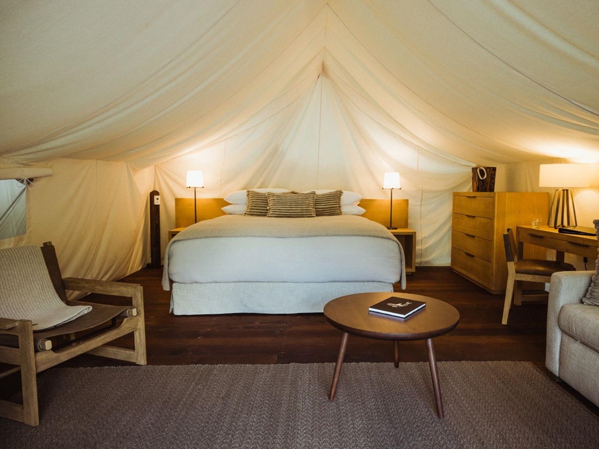 Luxury tent guest suite bed at Clayoquot Wilderness Resort in Vancouver, Canada