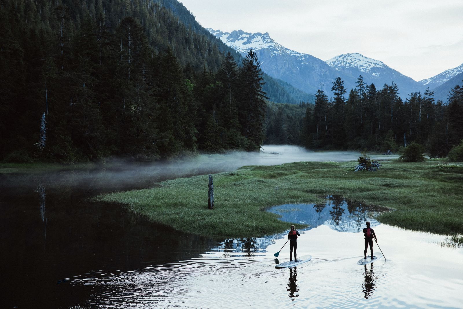 Paddle boarding on the grounds of Clayoquot Wilderness Resort in Vancouver, Canada