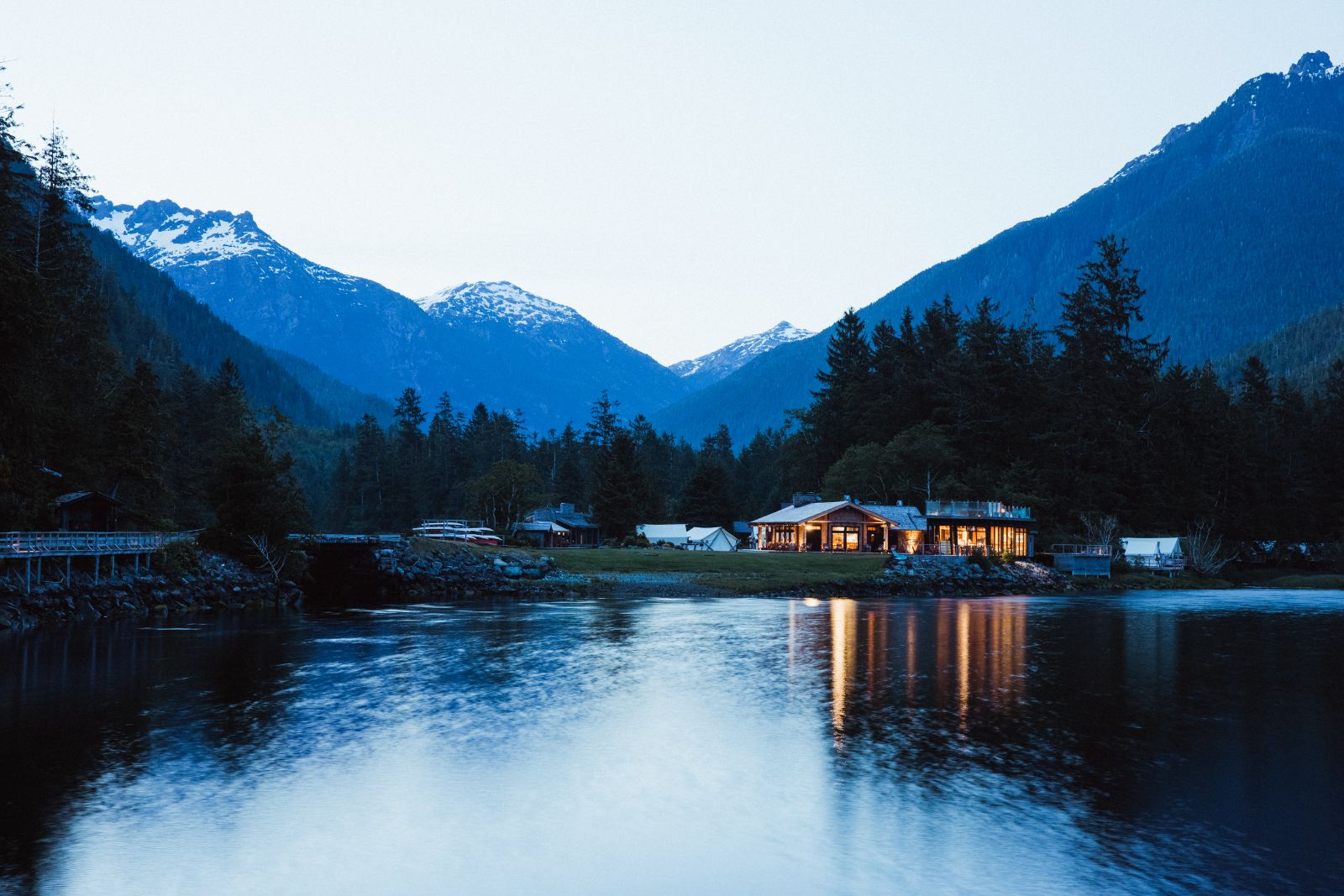 The outpost exterior and lake at Clayoquot Wilderness Resort in Vancouver, Canada