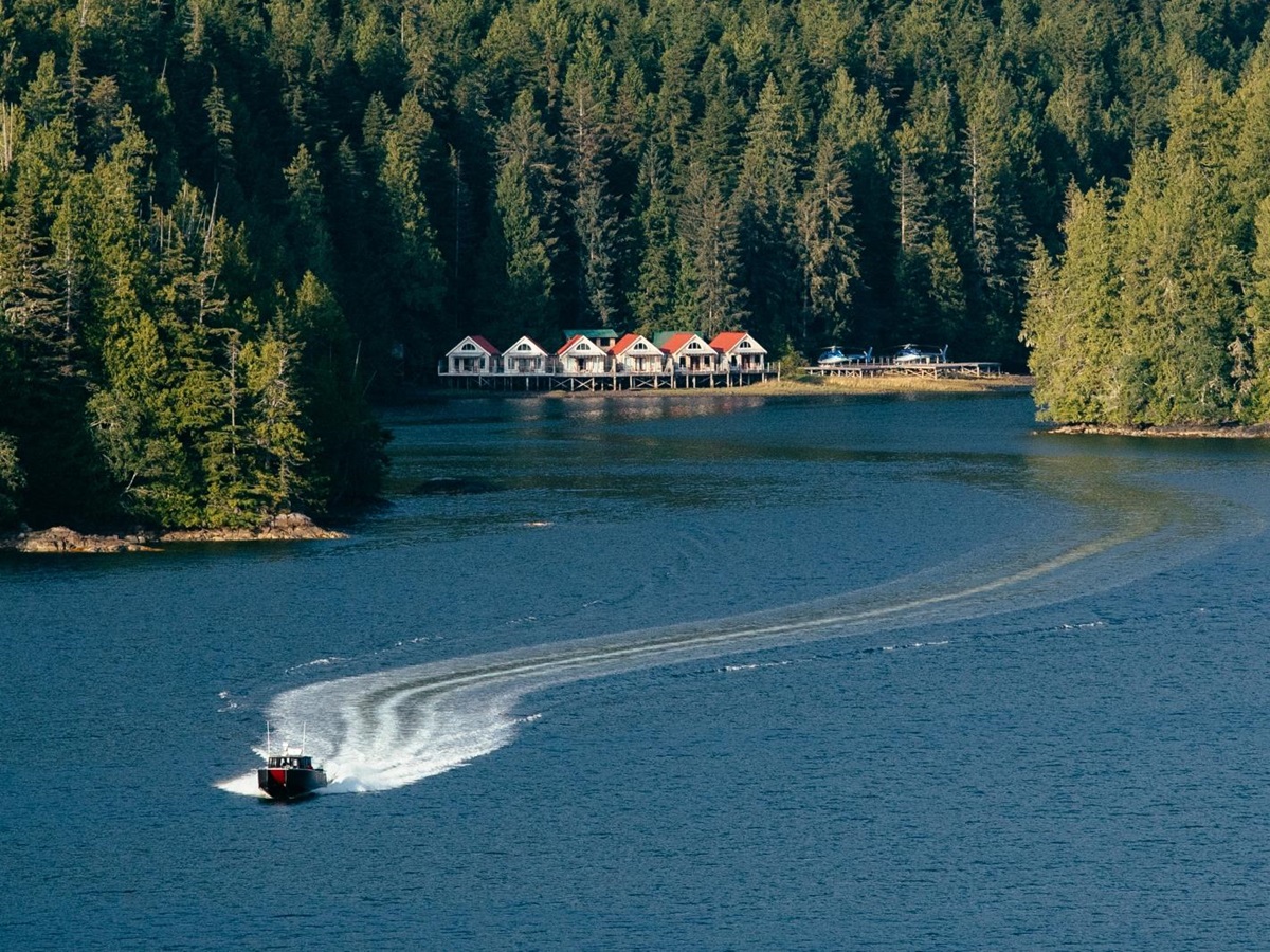 Aerial of speedboat coming away from the resort