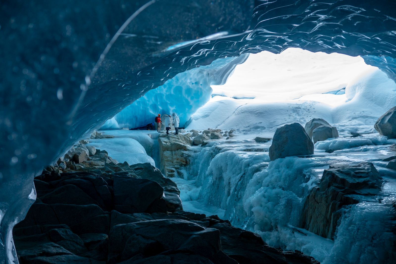 Guests on a tour of the local glacier at luxury private home The Belmont Estate in Whistler, Canada