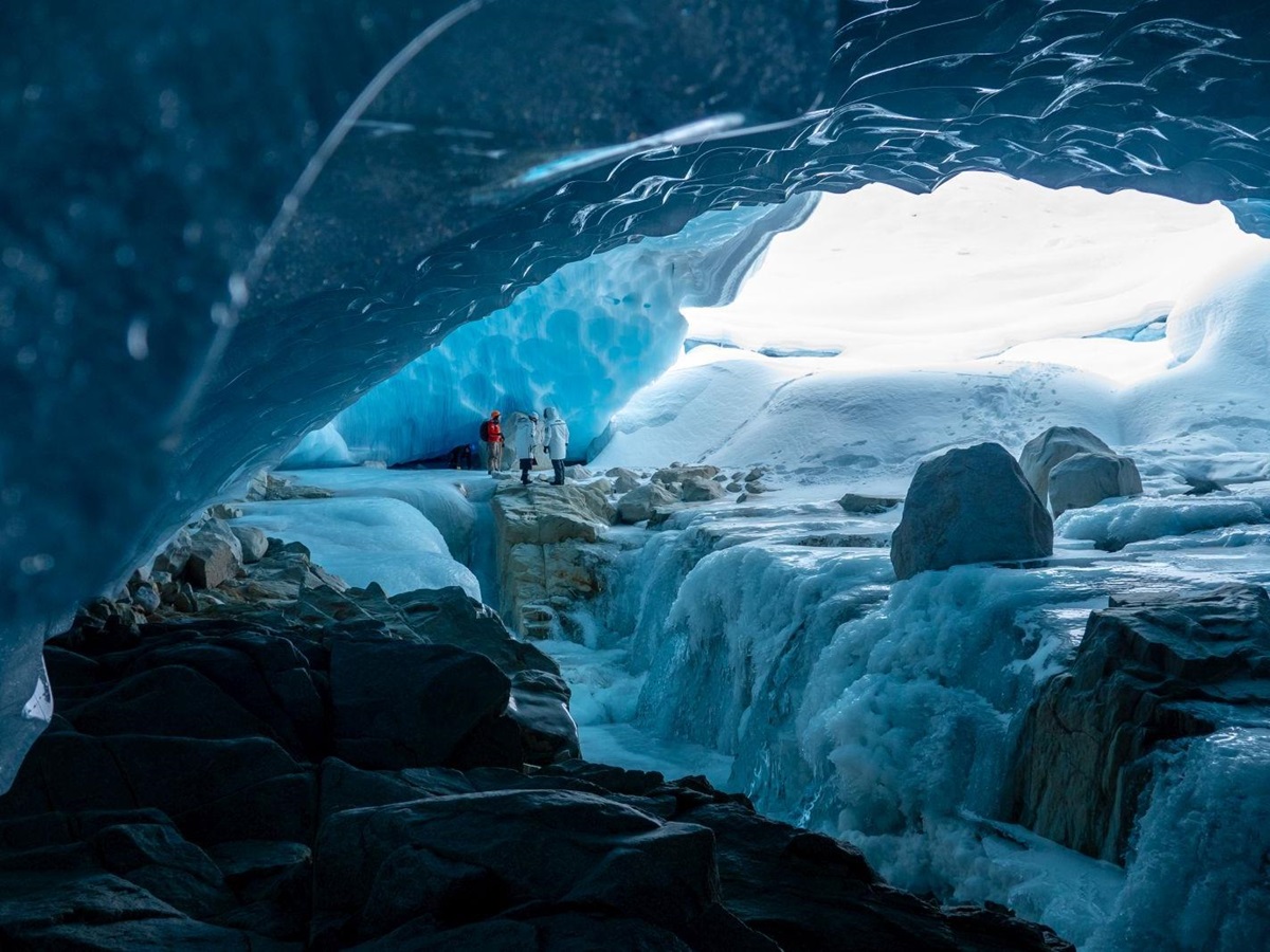 Guests on a tour of the local glacier at luxury private home The Belmont Estate in Whistler, Canada