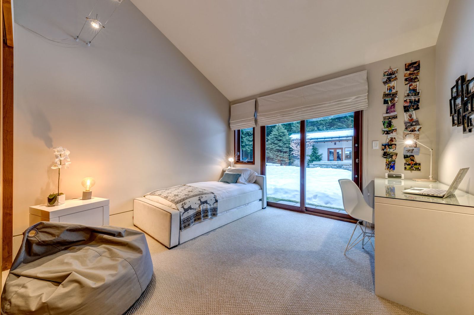 Single room with modern desk and direct access to the gardens at luxury private home The Belmont Estate in Whistler, Canada