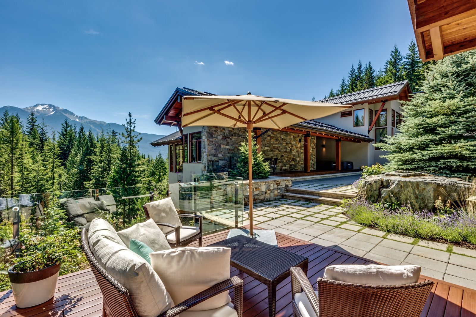 Small seating area on a terrace at luxury private home The Belmont Estate in Whistler, Canada