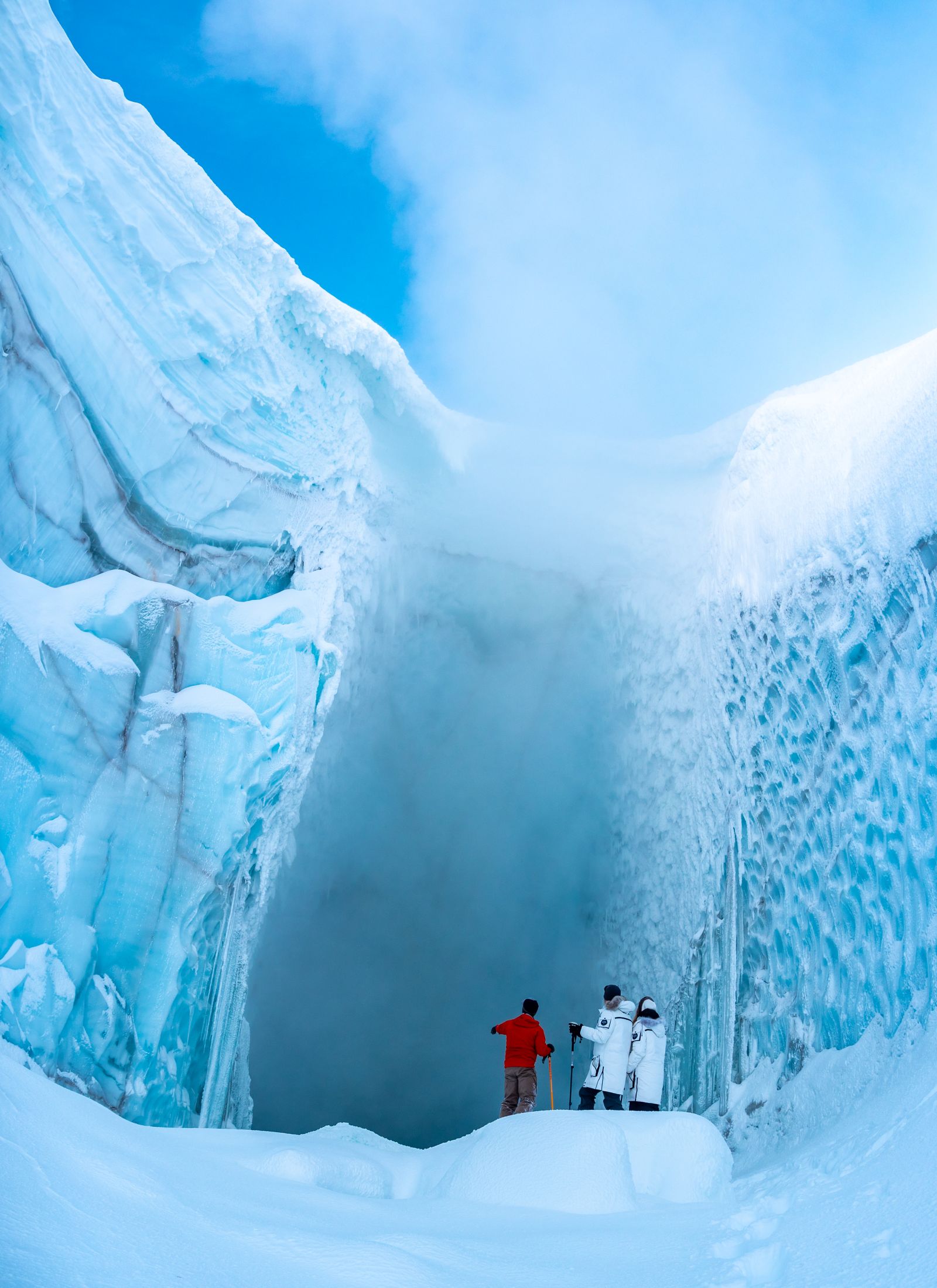 Guests visiting a volcano under ice while staying at luxury chalet The Belmont Estate in Whistler, Canada