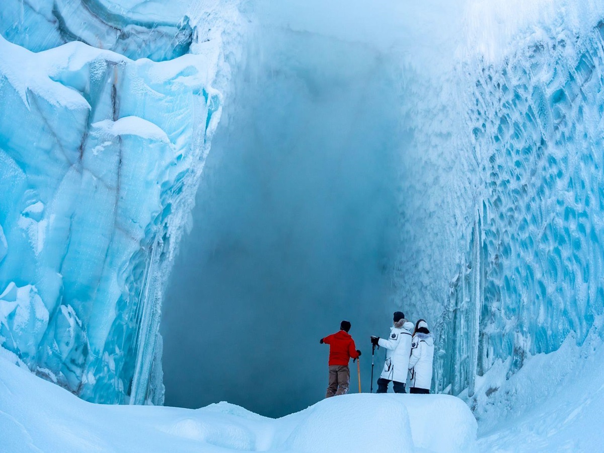Guests visiting a volcano under ice while staying at luxury chalet The Belmont Estate in Whistler, Canada