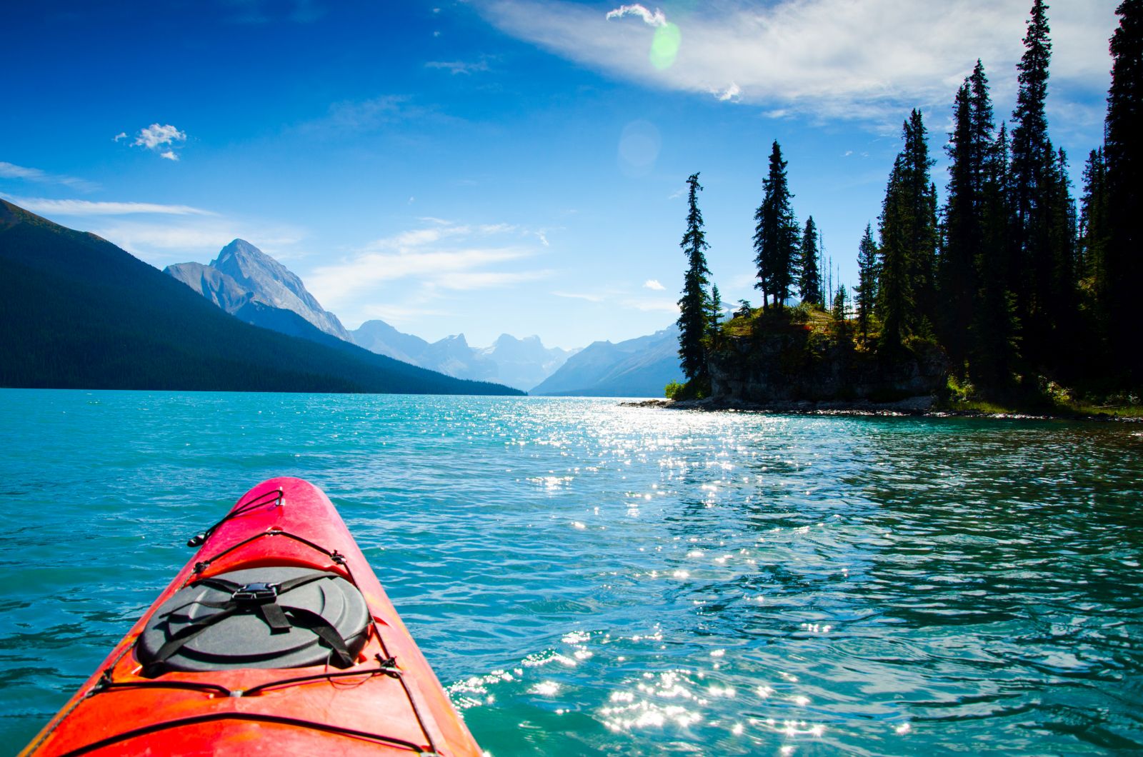Kayaking on a lake in Canada's Rocky Mountains