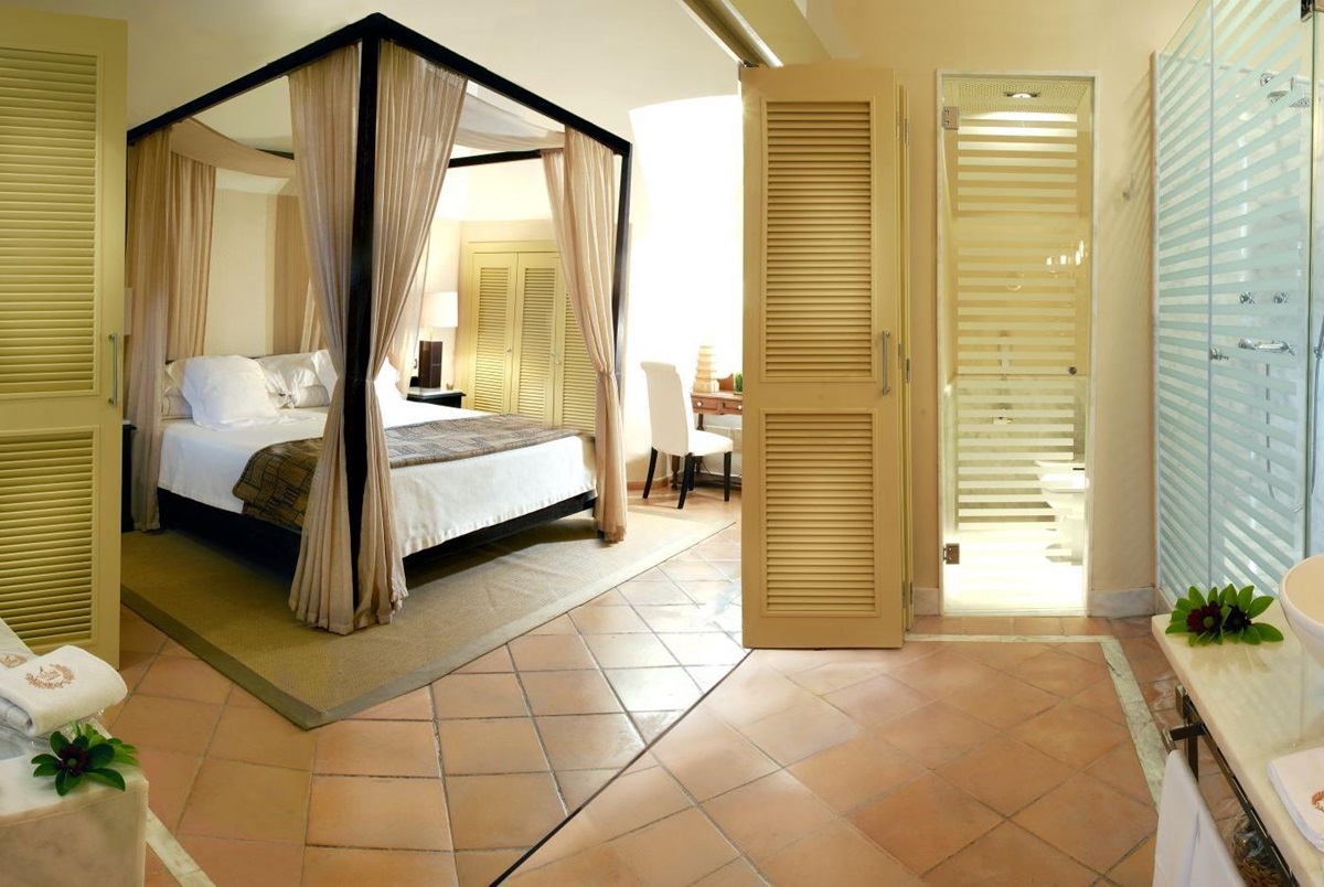 four poster bed in bedroom at bahia del duque in the canaries
