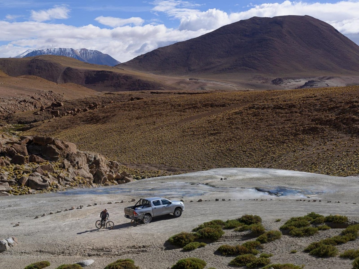 cyclist setting off on a tour in the desert