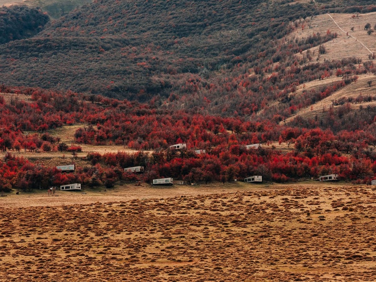 Aerial view of Awasi Patagonia amidst the autumn-coloured trees