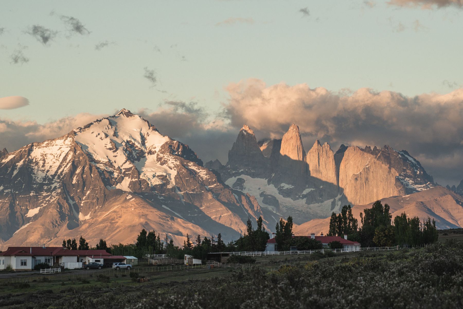 Distant view of Estancia Cerro Guido in Patagonia with Paine massif