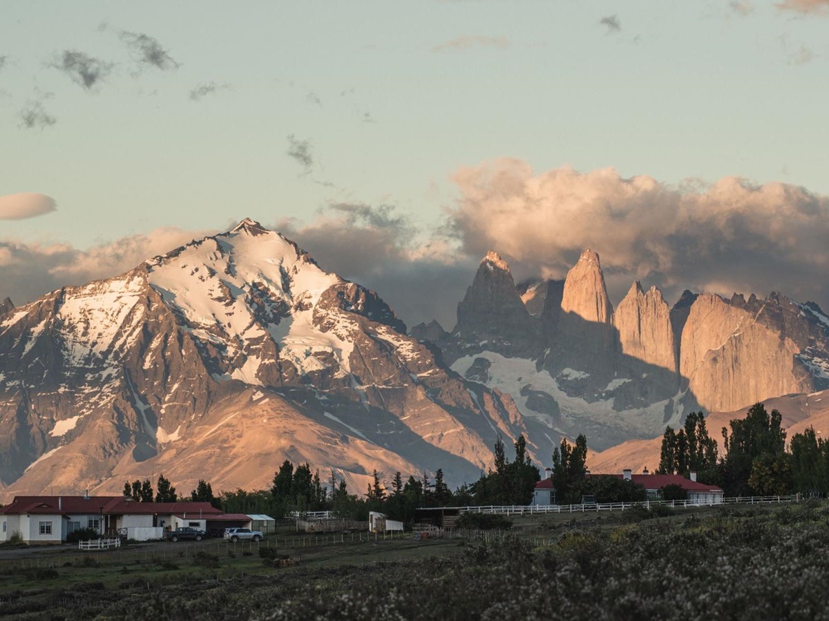 Distant view of Estancia Cerro Guido in Patagonia with Paine massif