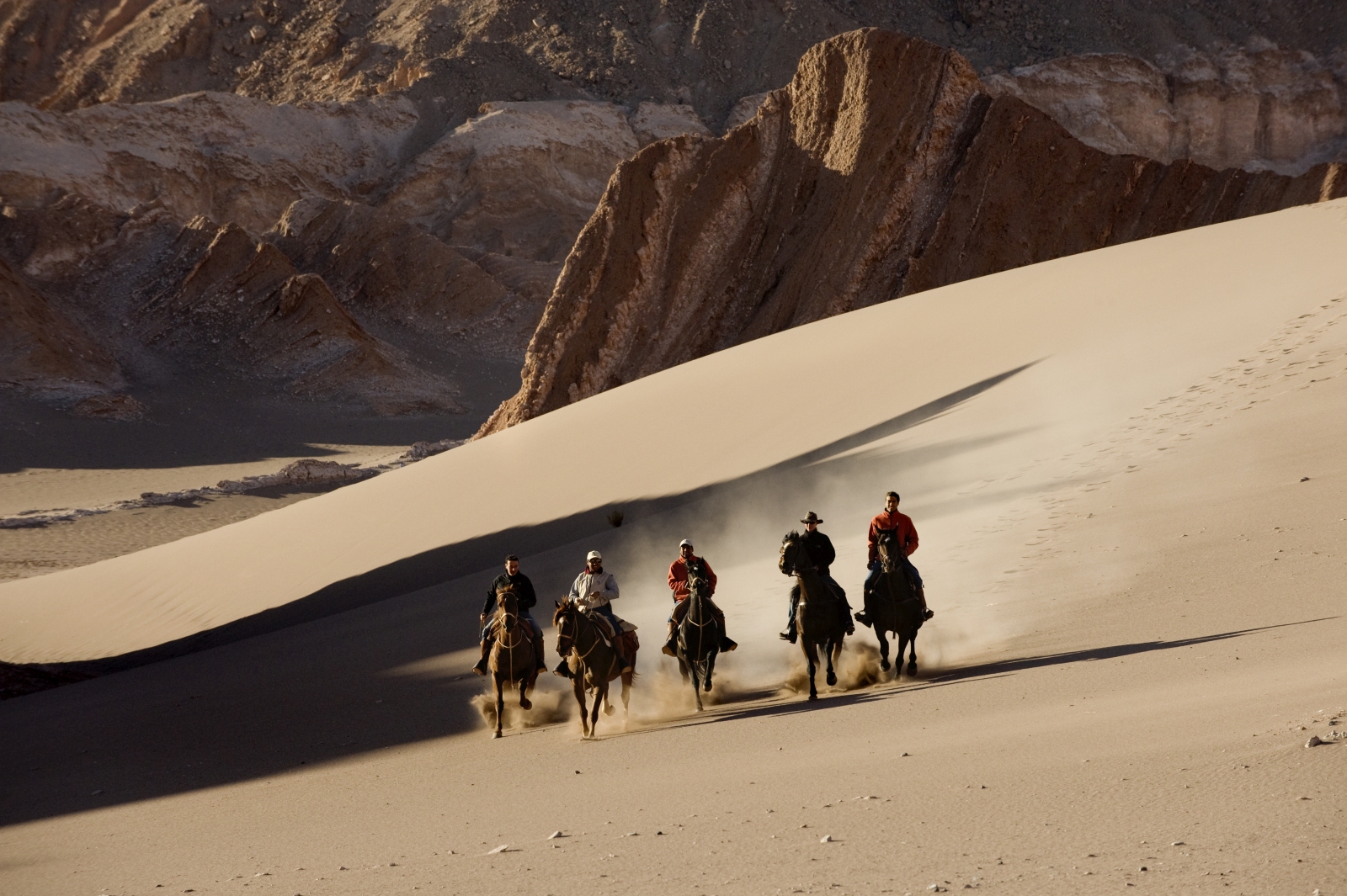 Five riders in the Atacama Desert
