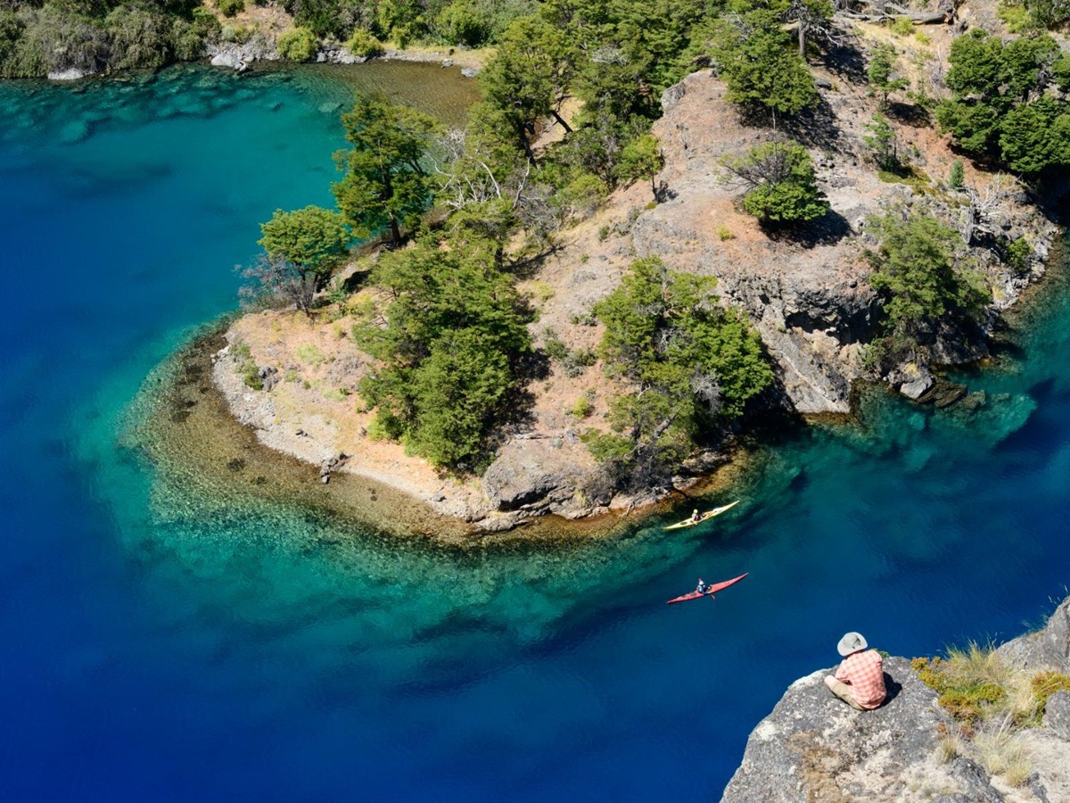 Guests kayaking along the Cochrane river from Explora Patagonia National Park lodge in Chile