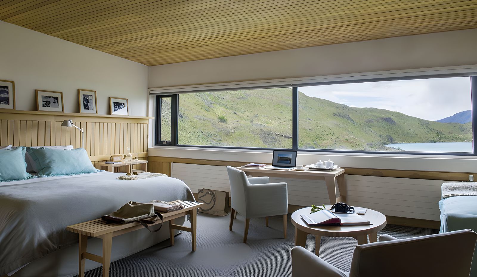 Guest suite bedroom with views of the National Park at Explora Torres del Paine in Chile