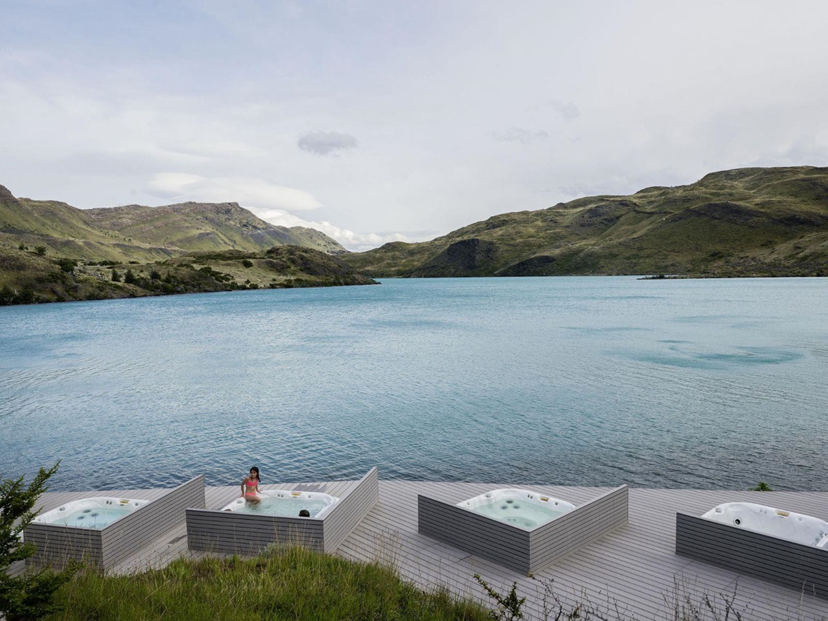 Outdoor lakefront jacuzzies at Explora Torres del Paine in the National Park of Chile