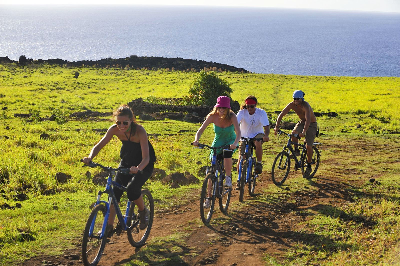 Group of people cycling on Easter Island from Explora Rapa Nui