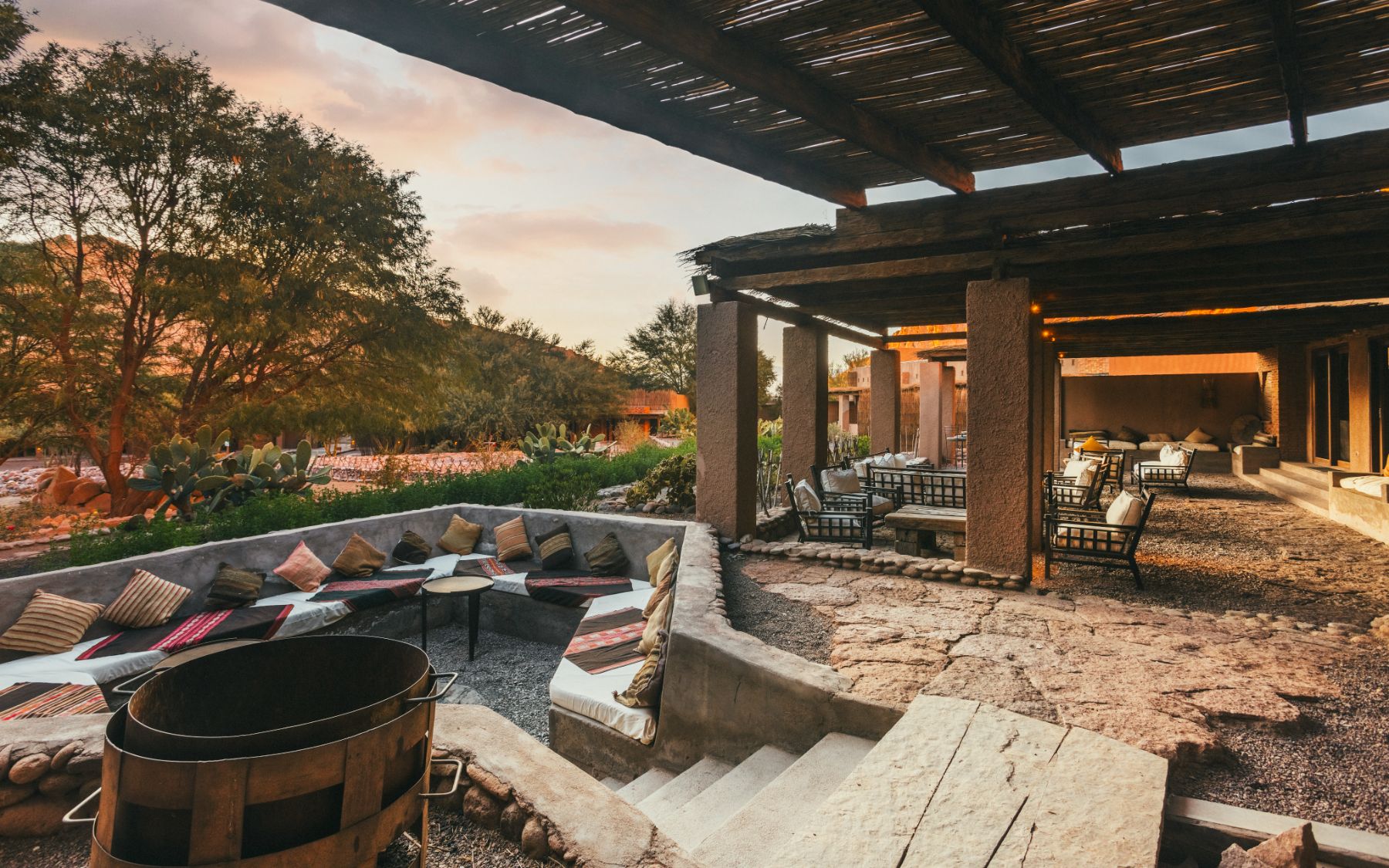 Outdoor terrace and firepit at Nayara Alto Atacama lodge in Chile