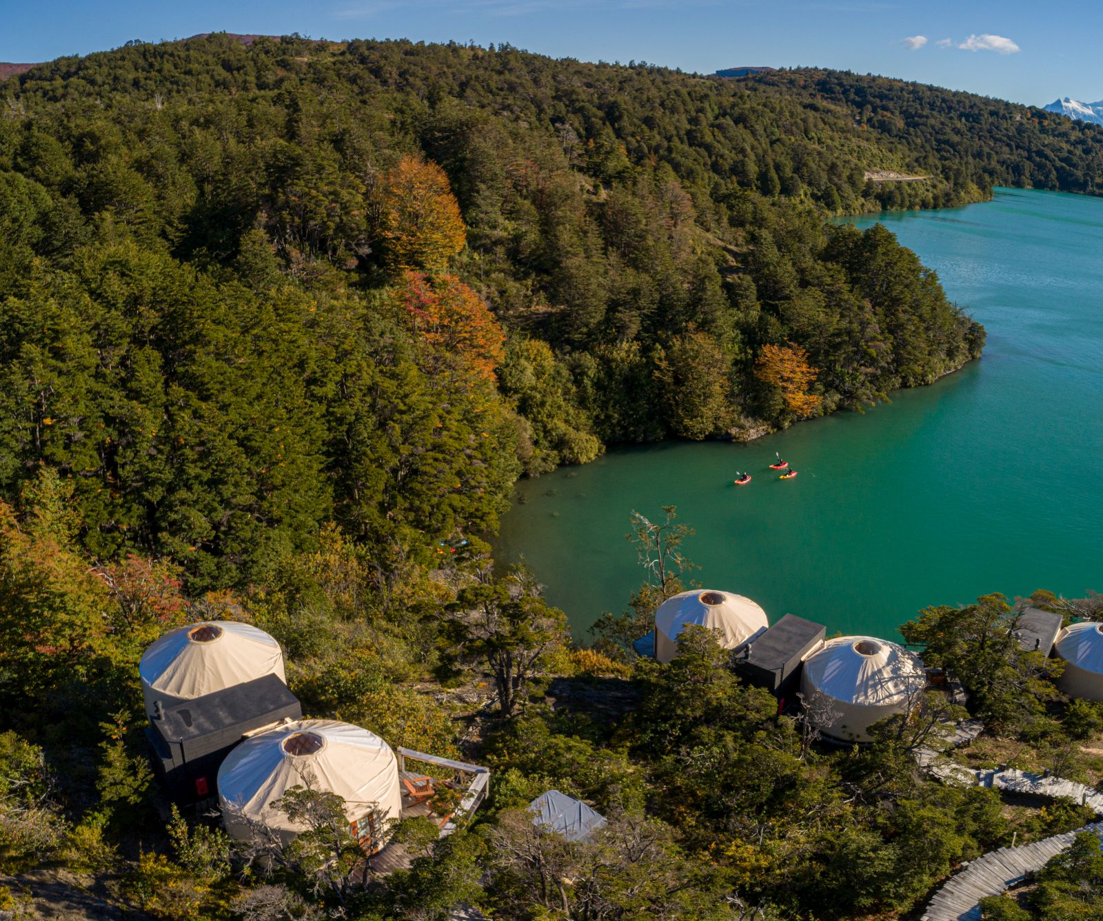 Aerial view of the yurts at Patagonia Camp in Chile overlooking the turquoise waters of Lake Toro
