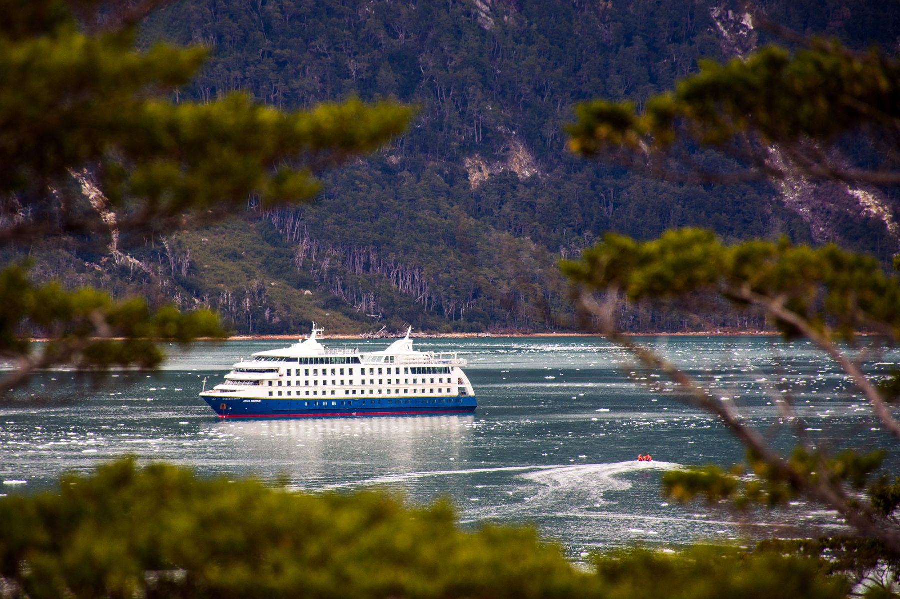 The the Stella Australis expedition cruise in a sheltered bay in Patagonia