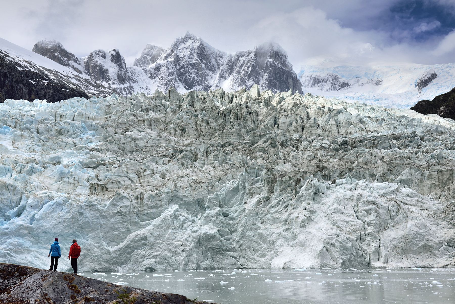 Guests of the Stella Australis at the face of an enormous glacier in Patagonia