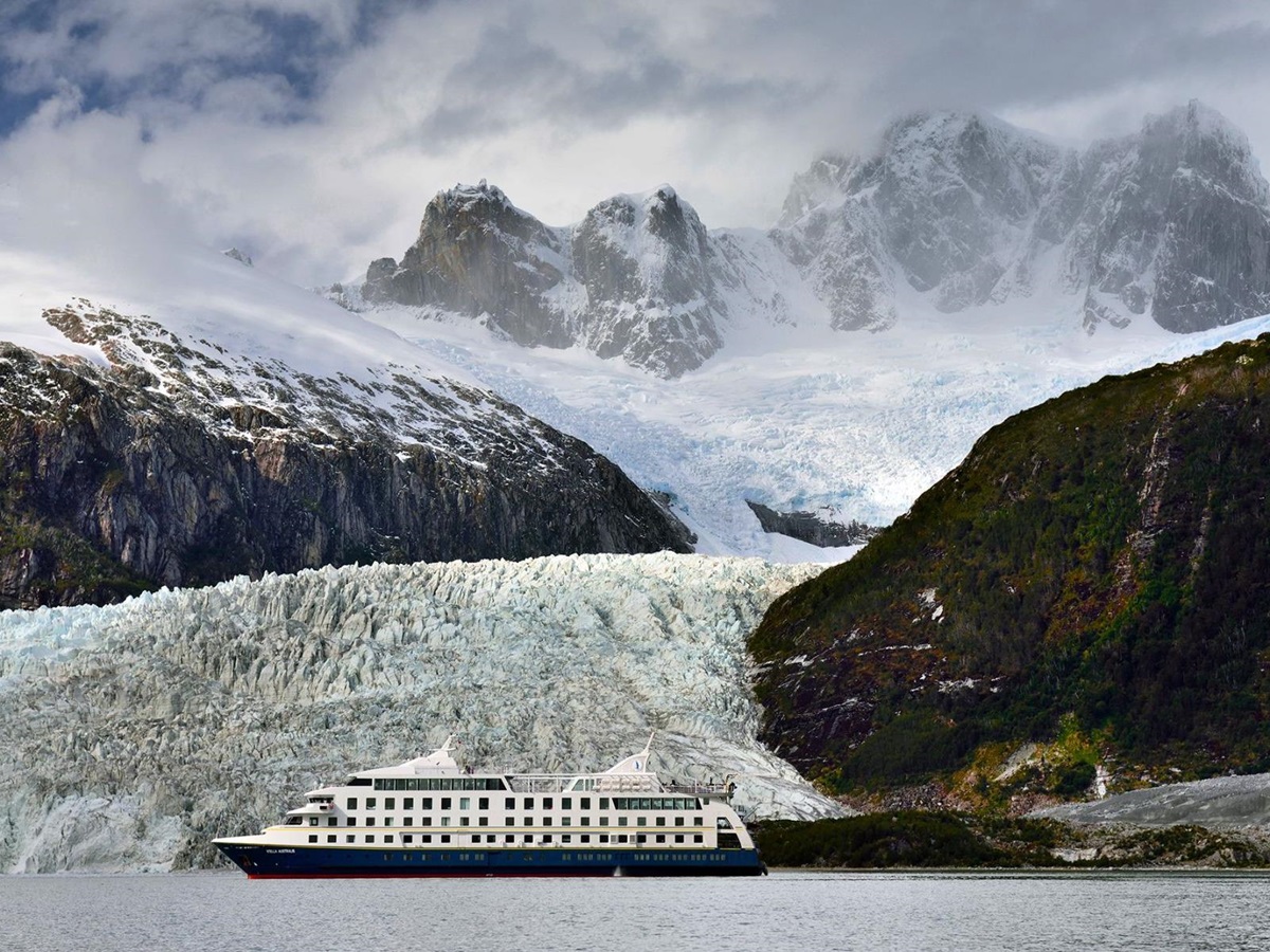 The Stella Australis at anchor in front of a vast glacier in Patagonia