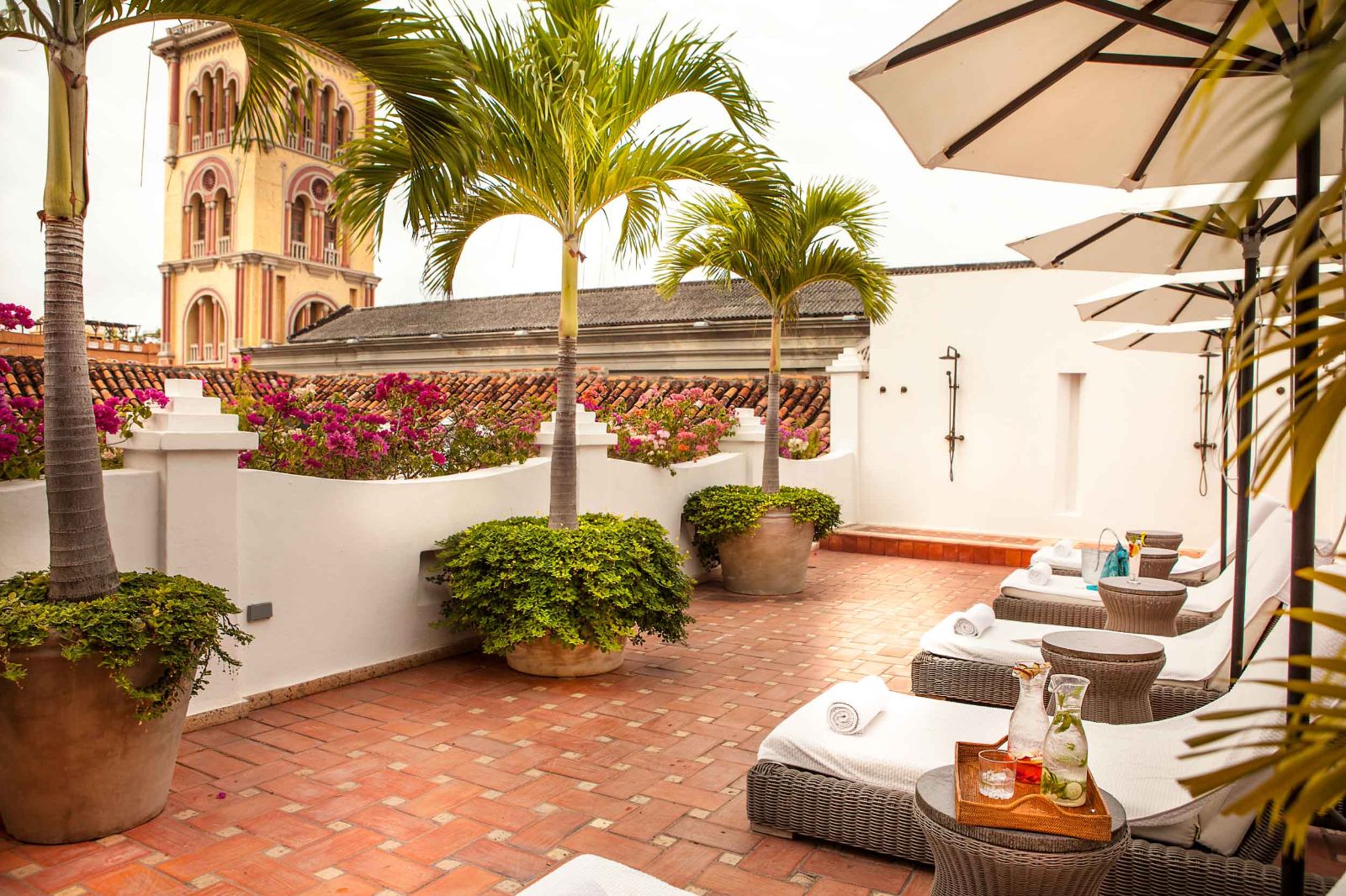 Virrey guest suite loungers and terrace at Casa San Agustin in Cartagena, Colombia