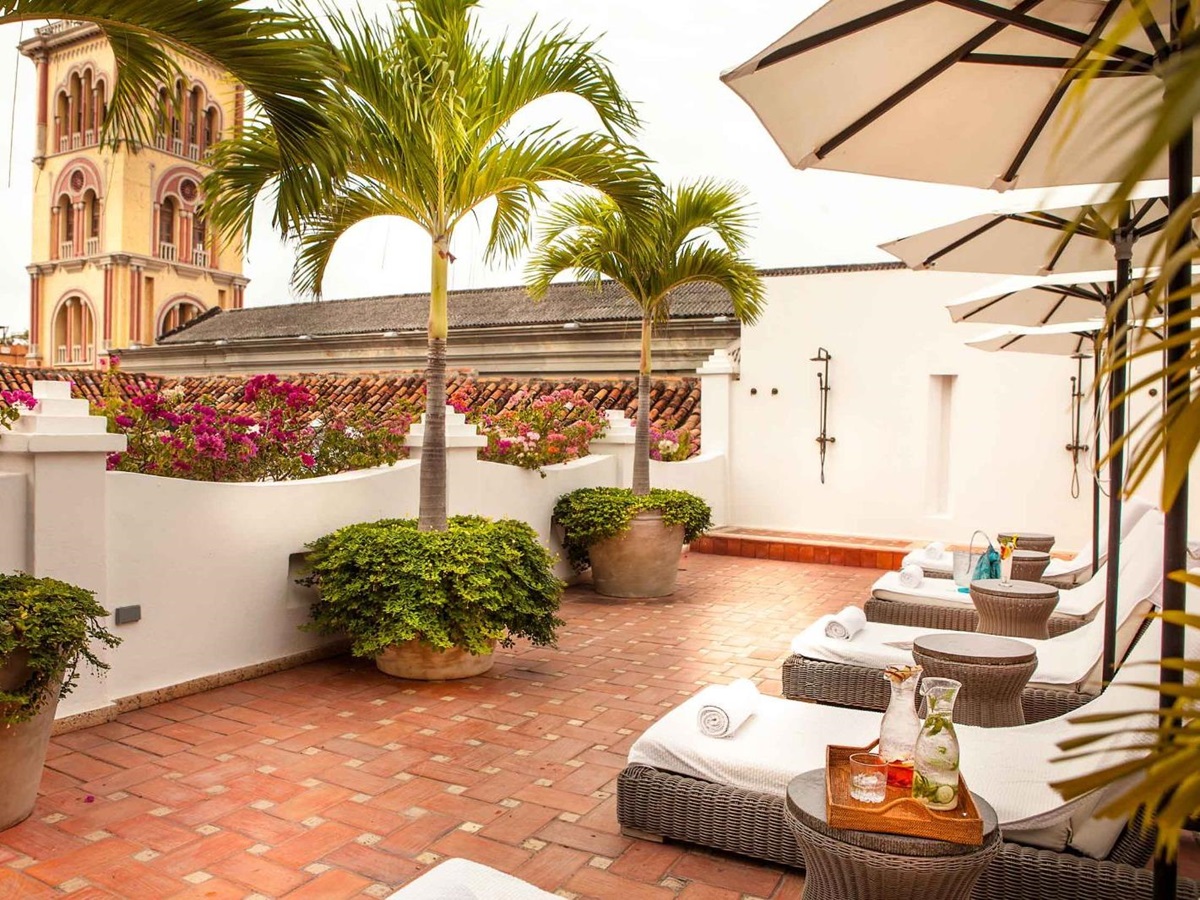 Virrey guest suite loungers and terrace at Casa San Agustin in Cartagena, Colombia