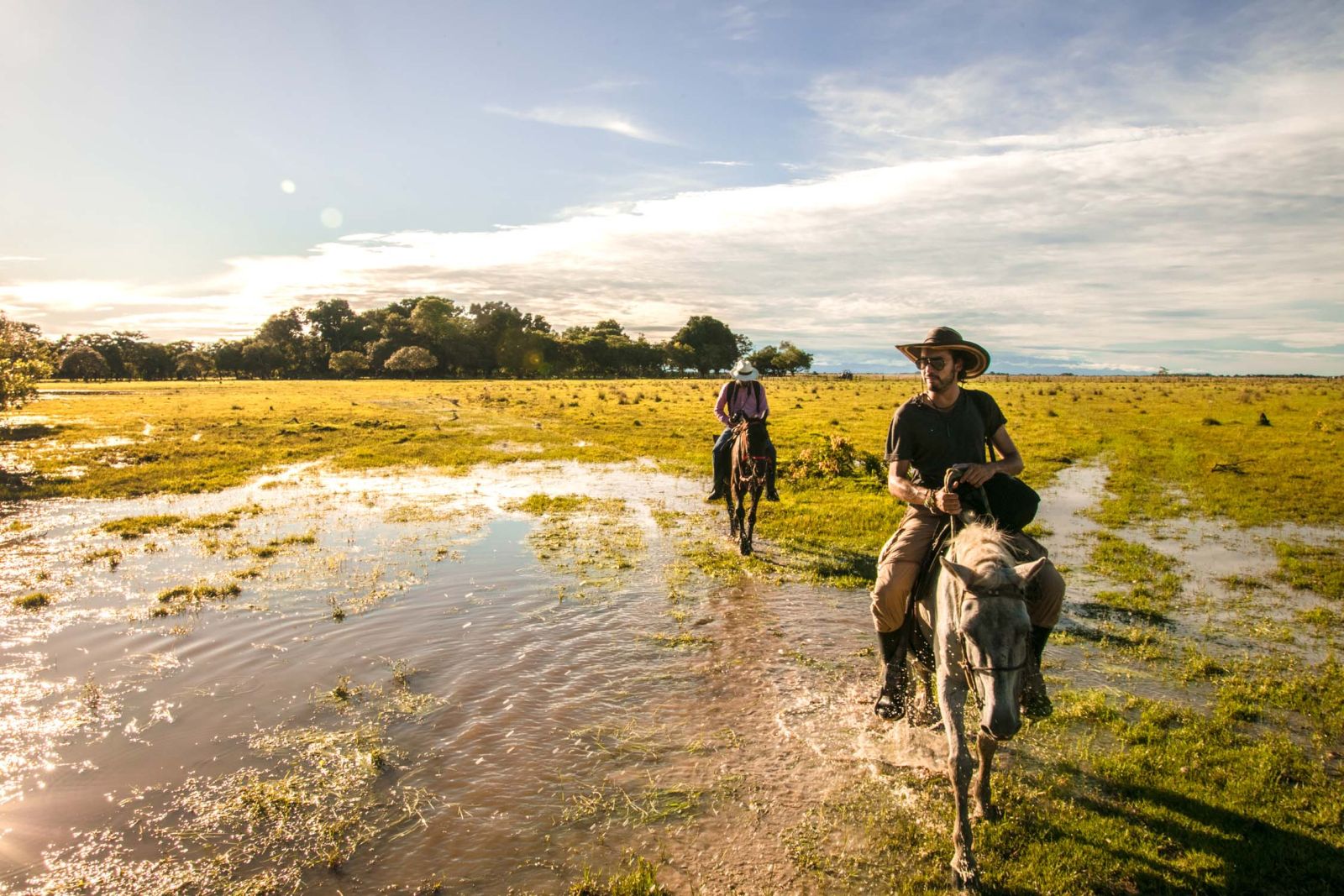 Two people riding at Corocora Camp in Colombia