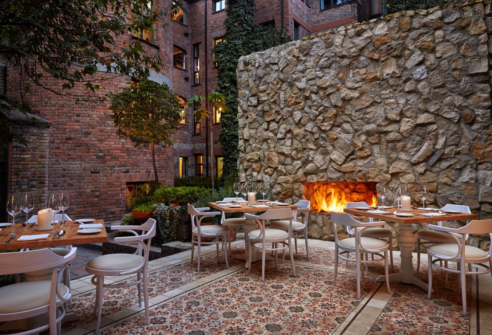 Alfresco dining terrace and fireplace at Four Seasons casa Medina in Bogota, Colombia