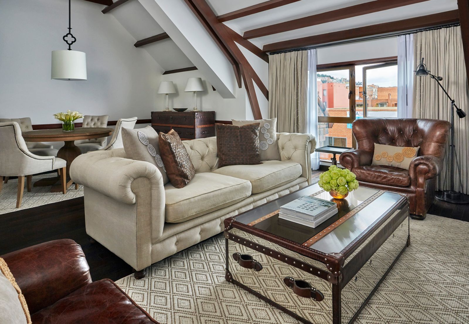 Cream and brown guest suite living area at Four Seasons casa Medina in Bogota, Colombia