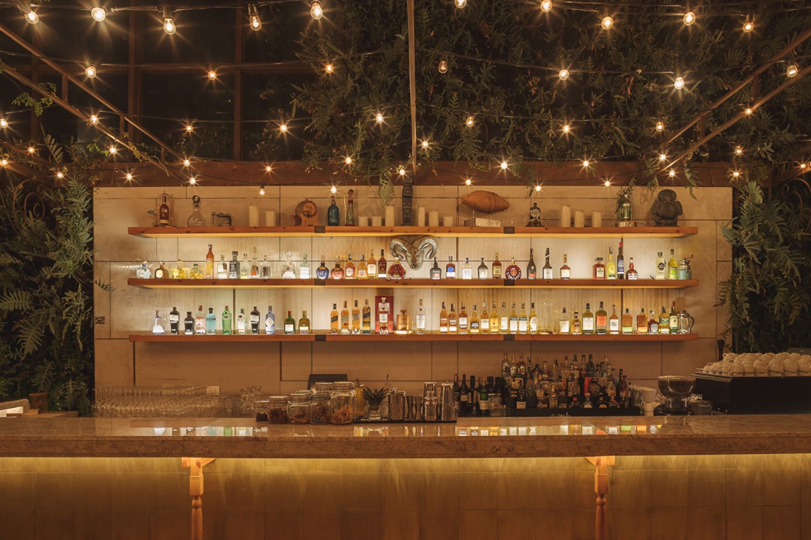 Outdoor bar area at night at Four Seasons casa Medina in Bogota, Colombia