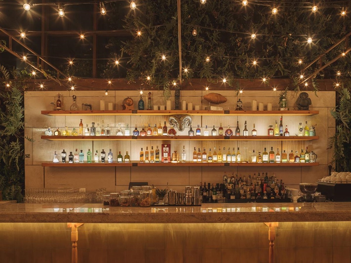 Outdoor bar area at night at Four Seasons casa Medina in Bogota, Colombia