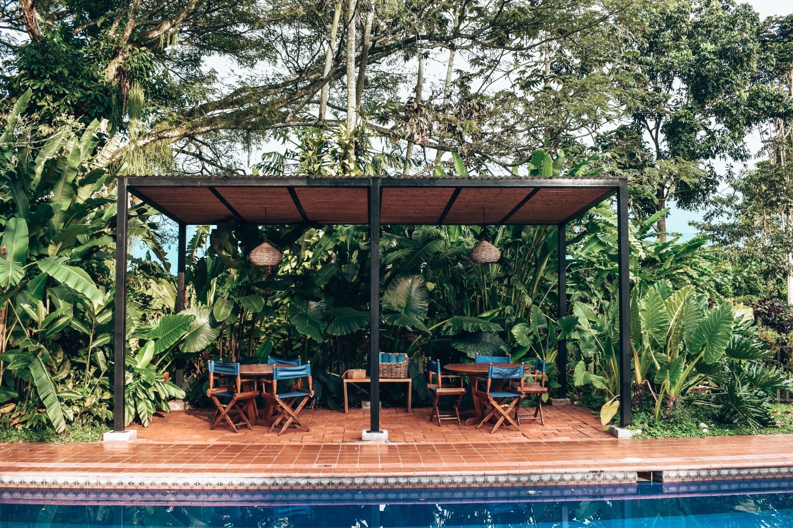 Pool seating area at Hacienda Bambusa in Colombia's coffee region