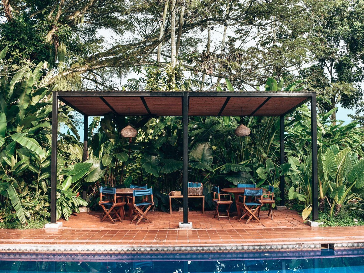 Pool seating area at Hacienda Bambusa in Colombia's coffee region