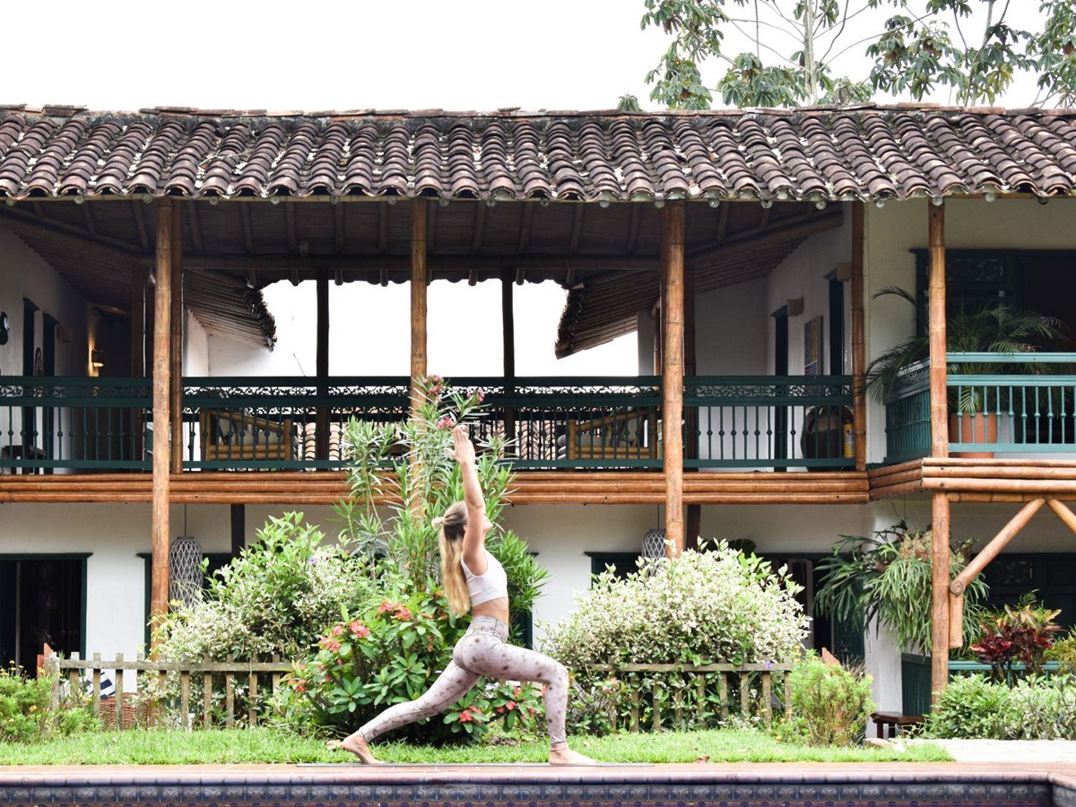 Yoga on the pavilion at Hacienda Bambusa in Colombia's coffee region