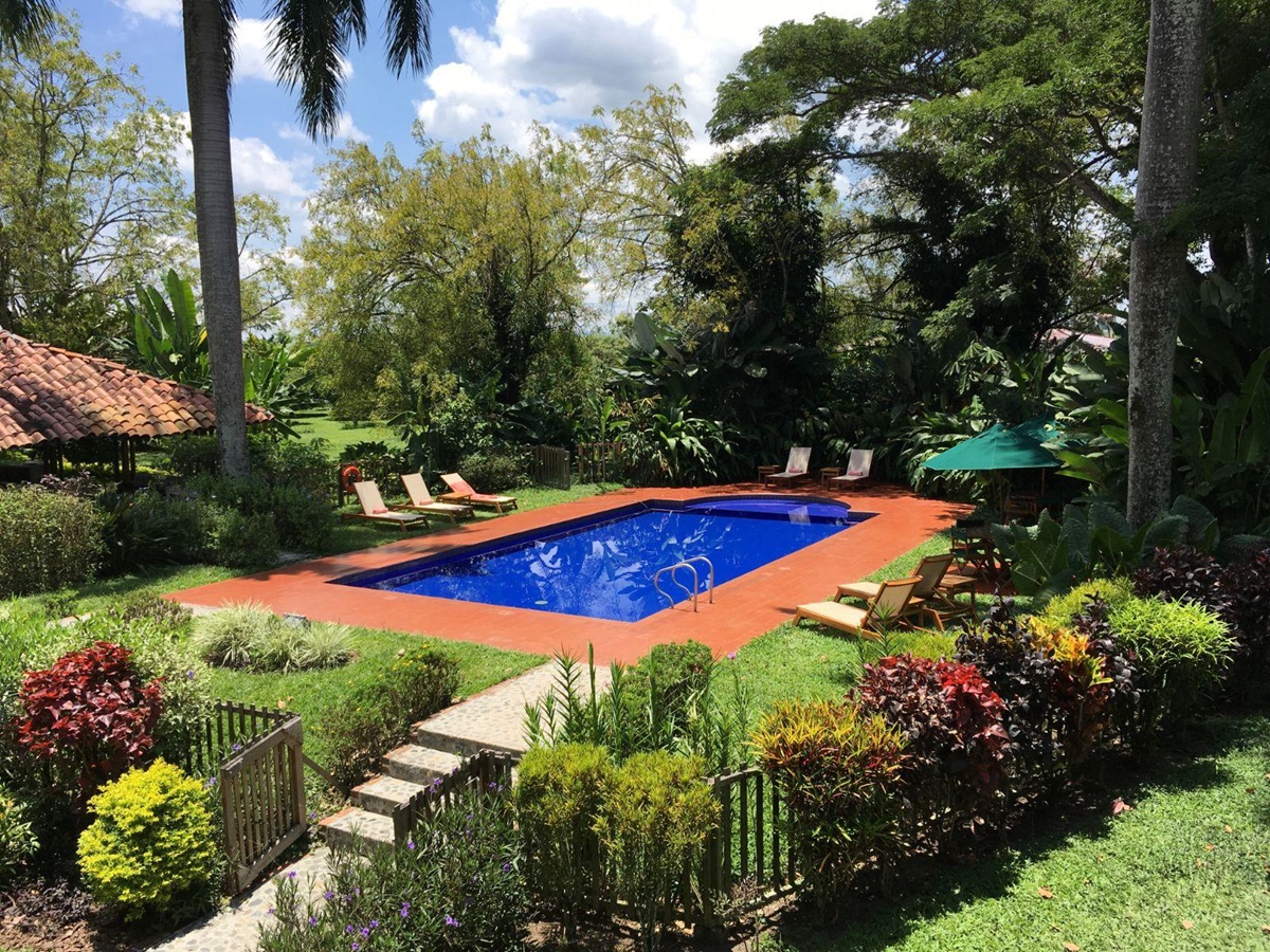 Pool and gardens at Hacienda Bambusa in Colombia's coffee region