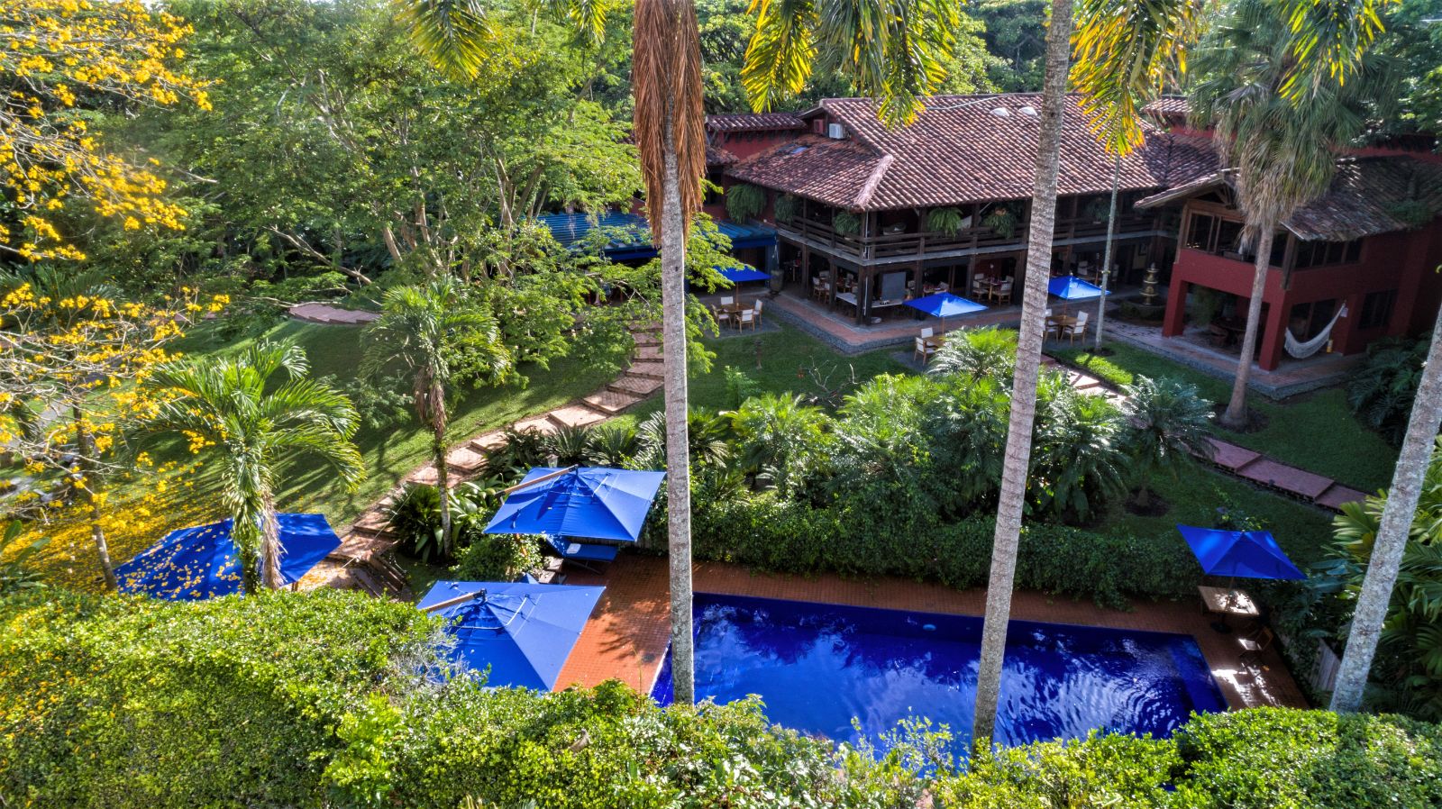 Aerial view of the pool and grounds at Hotel Boutique Sazagua in Colombia's coffee region