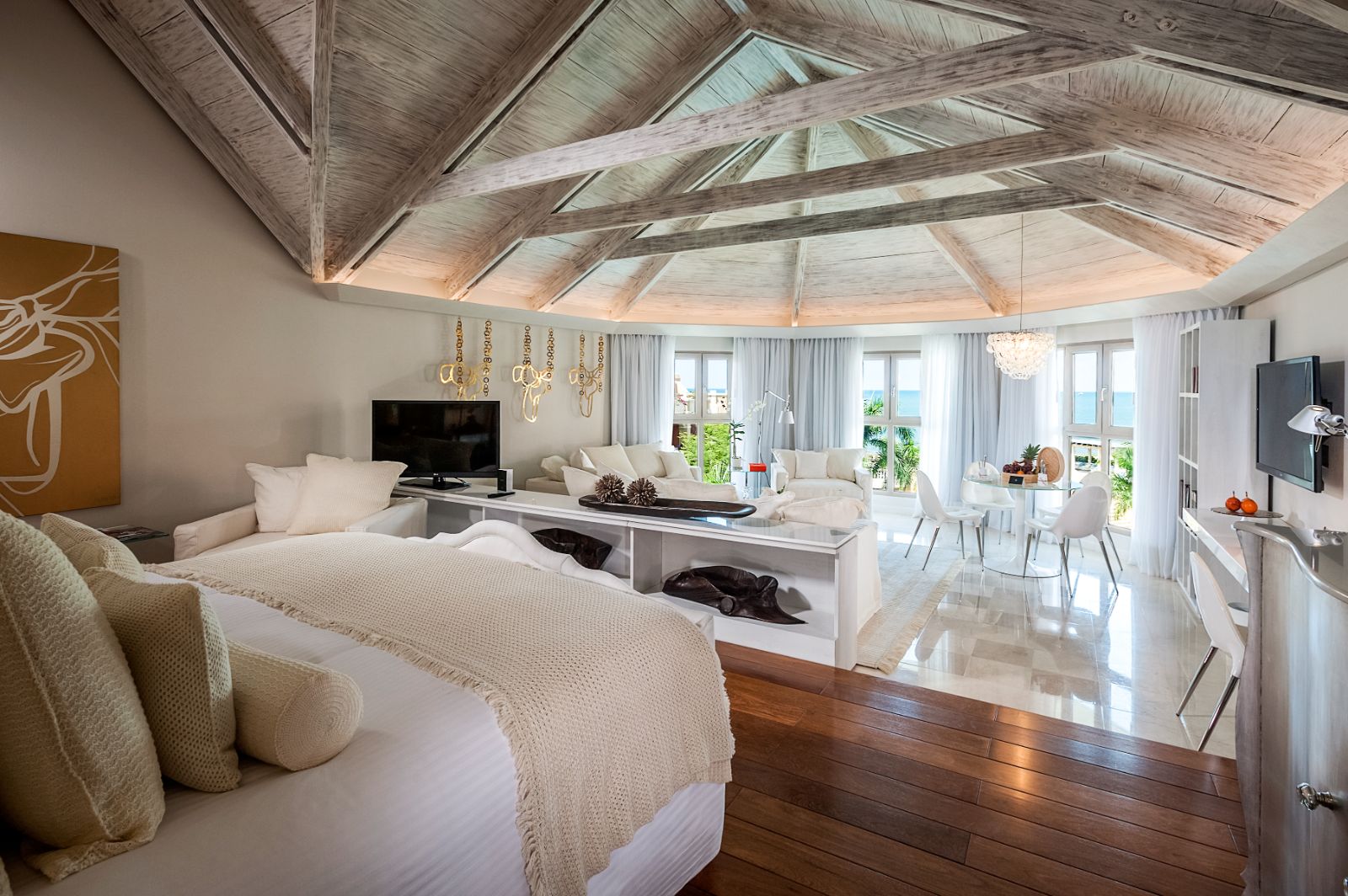 White guest suite bedroom at Sofitel Legend Santa Clara in Cartagena, Colombia