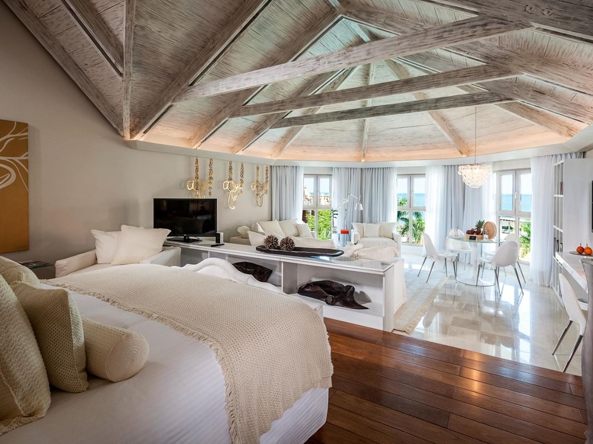 White guest suite bedroom at Sofitel Legend Santa Clara in Cartagena, Colombia