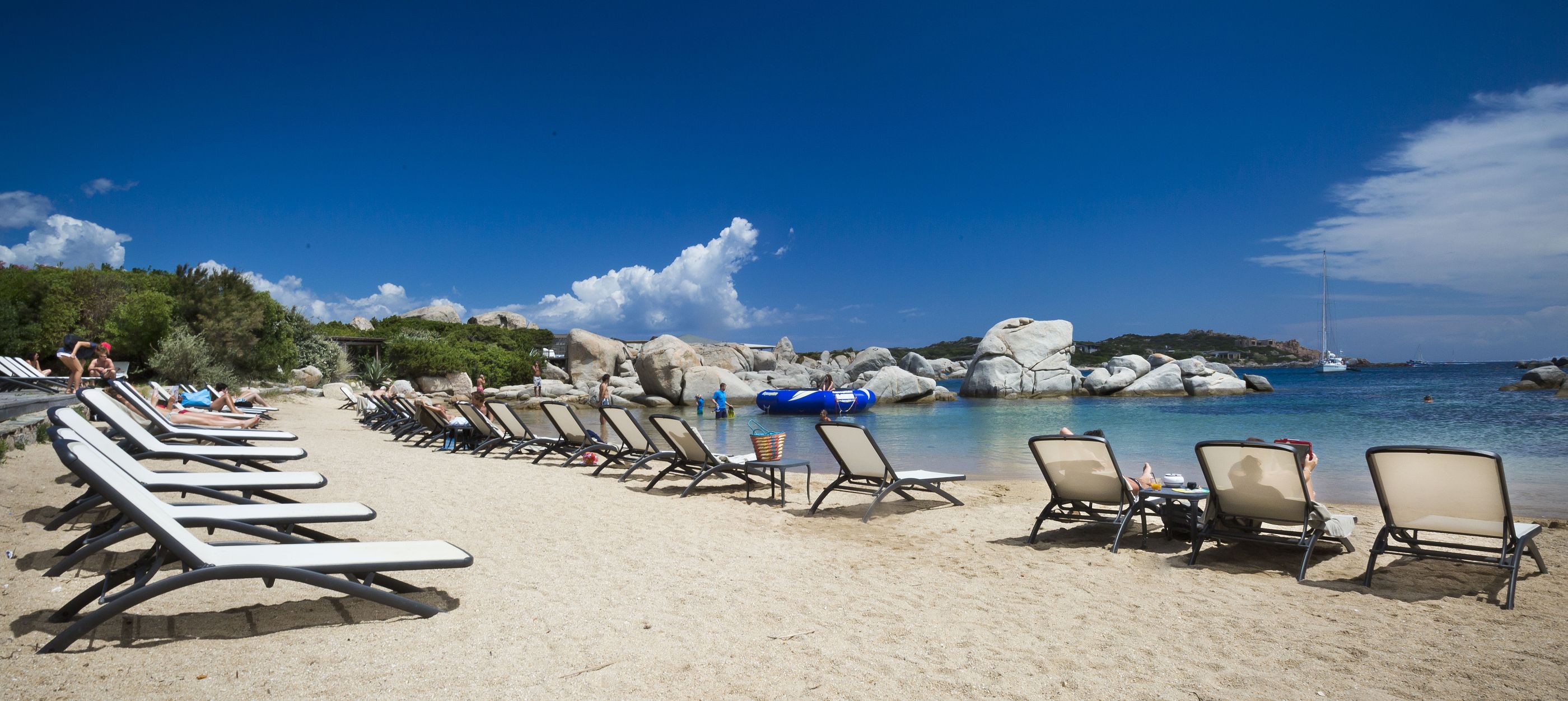 sunbeds on the beach at Hotel  & Spa des Pecheurs, Corsica, France