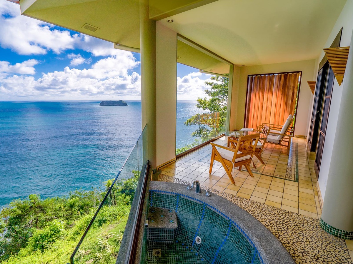 Guest suite terrace with bathtub at Arenas del Mar in Costa Rica