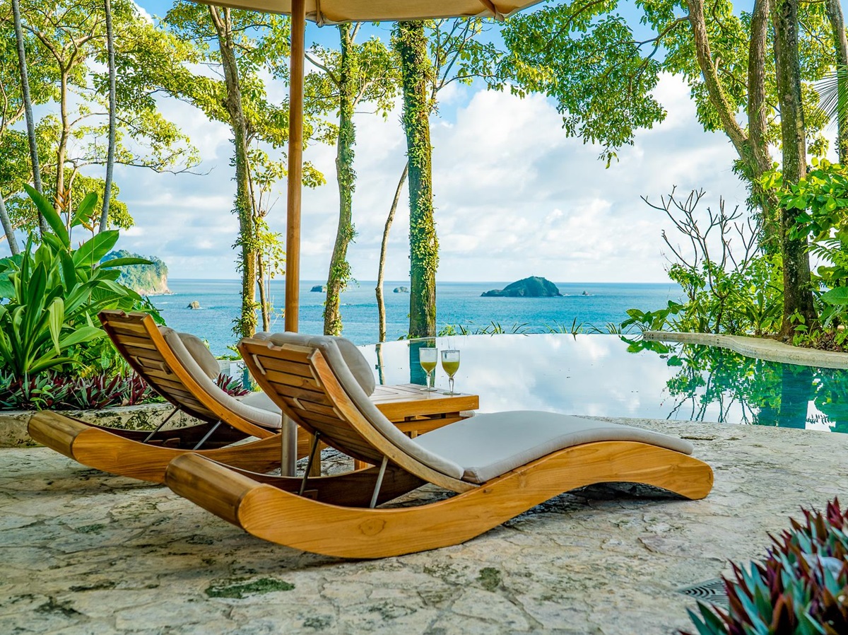 Sunbeds by the swimming pool at Arenas del Mar in Costa Rica