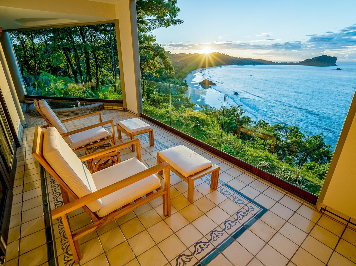 Guest suite terrace with ocean views at Arenas del Mar in Costa Rica