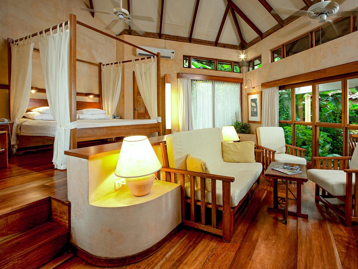 Guest bedroom and living area at Capitan Suizo in Tamarindo