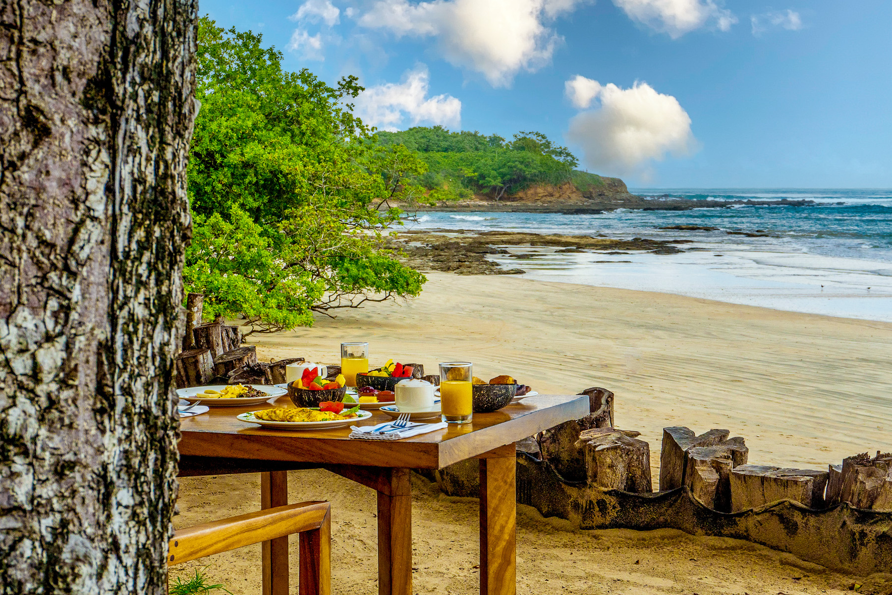 A table set up for private dining on the beach at Capitan Suizo in Tamarindo