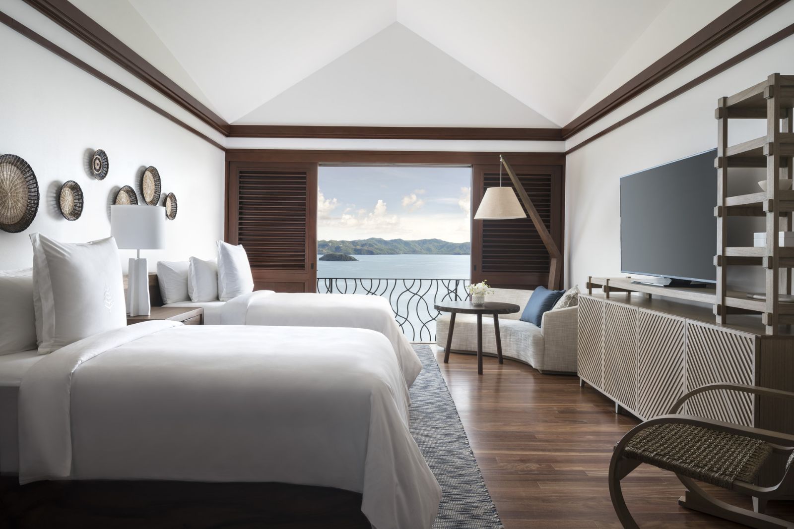 Twin bed guest suite at Four Seasons Costa Rica on the Papagayo Peninsula