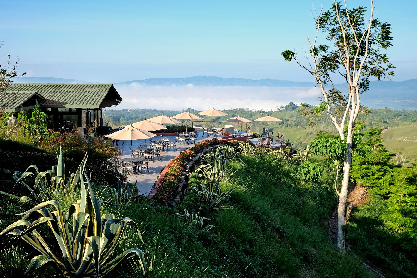 Alfresco dining and mountain views from Hacienda Alta Gracia Costa Rica