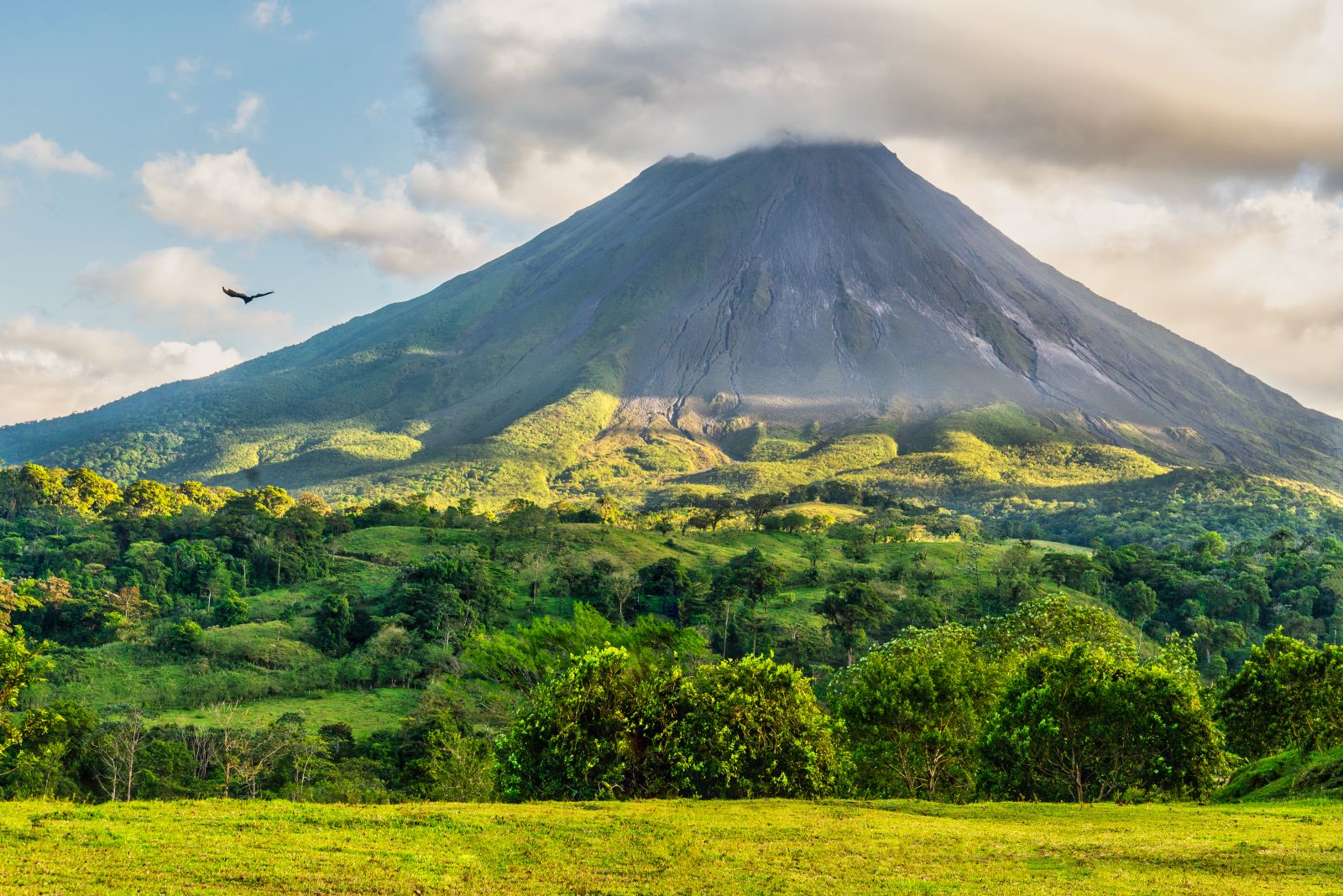 The cone of the Arenal Volcano in Costa Rica and surrounding forests